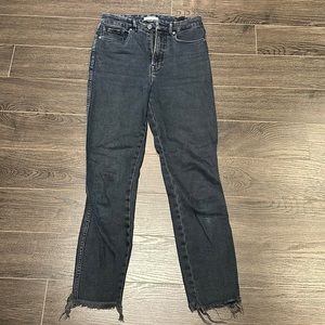 Good American straight blue jeans with frayed hem